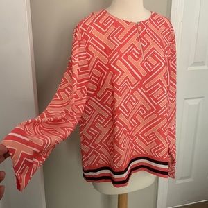 Tommy’s blouse size L